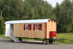 WEIRO® forest kindergarten trailer with 8 m long body, roof overhang, and propane gas heater.